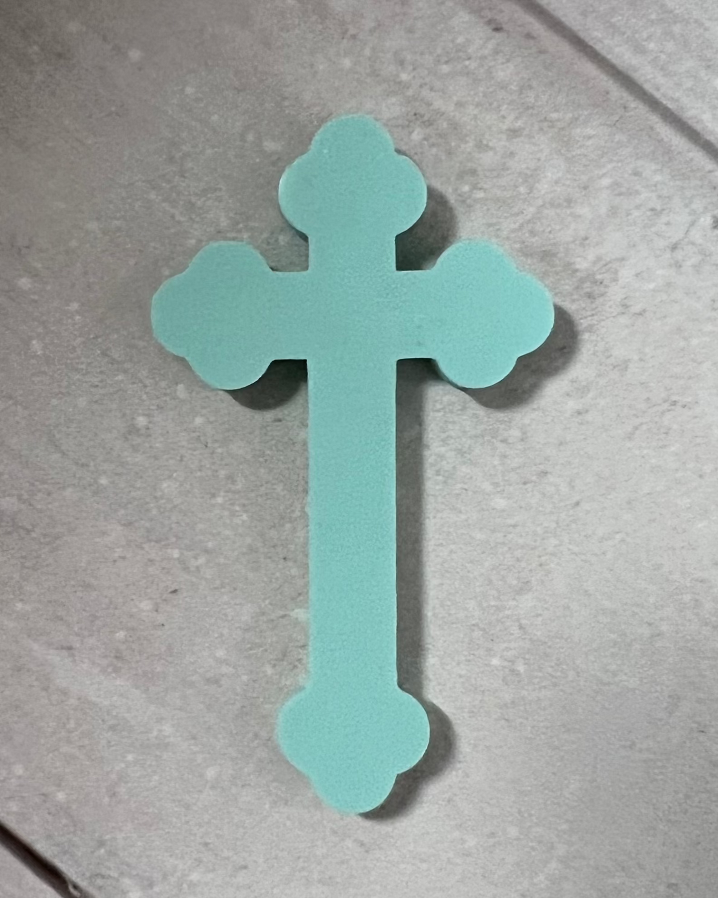 Crucifix aimant vert clair
