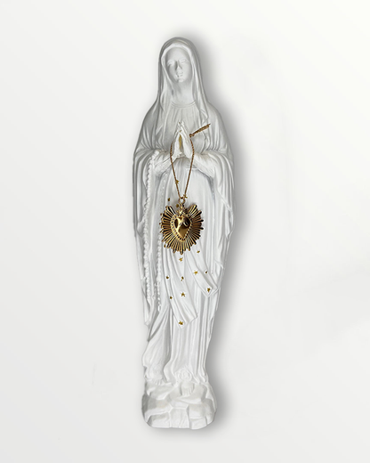 Statuette de la Vierge ex-voto