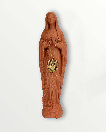 Statuette de la Vierge ex-voto